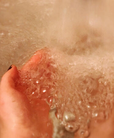 Hand Under Running Water